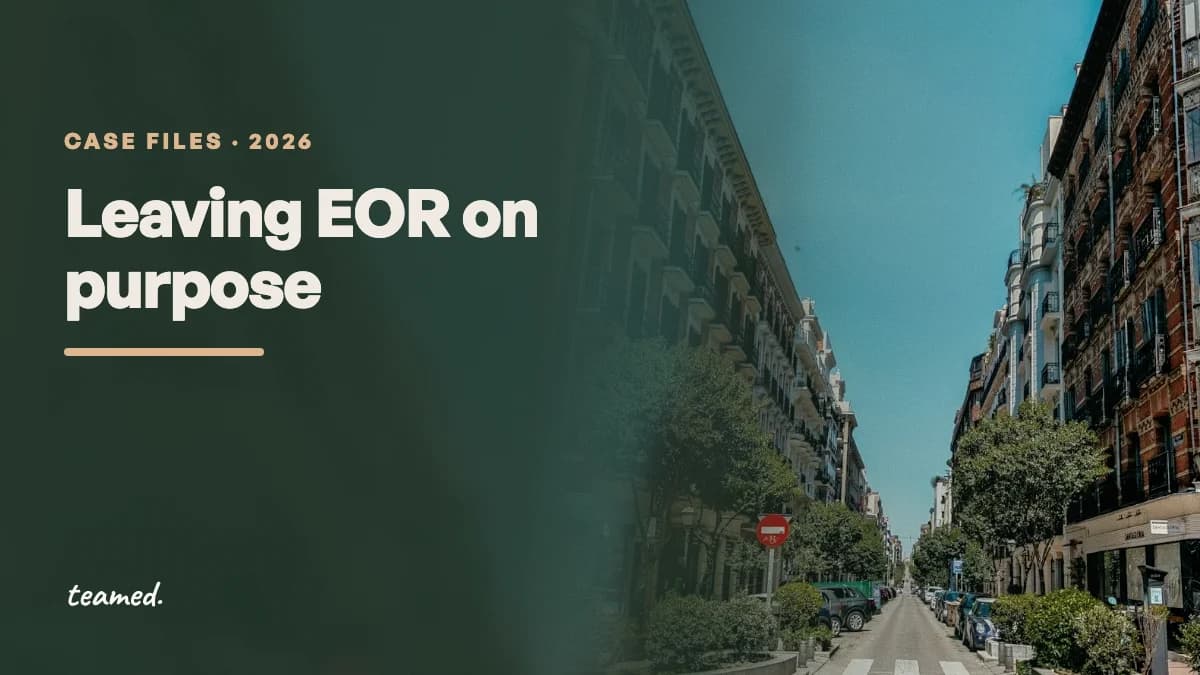 A sunlit Madrid street lined with brick apartment buildings under a clear blue sky. Case file: Leaving EOR on Purpose.