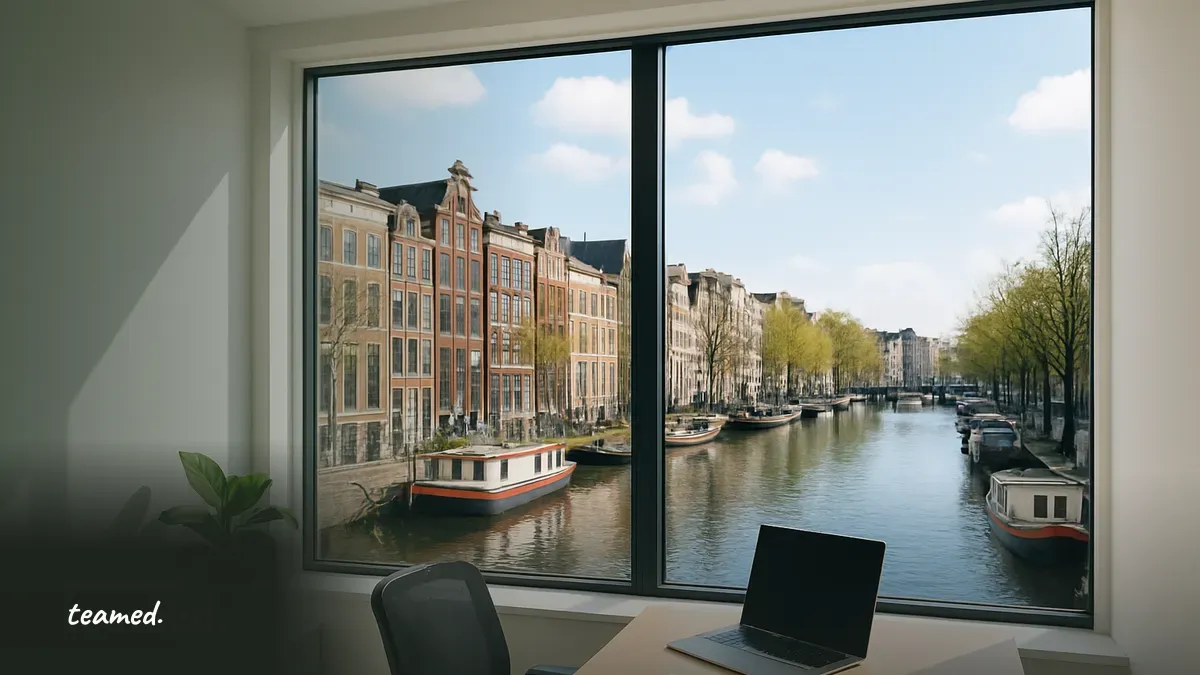 A scenic view of Amsterdam's canals and buildings, symbolizing the expat experience and tax benefits in the Netherlands.
