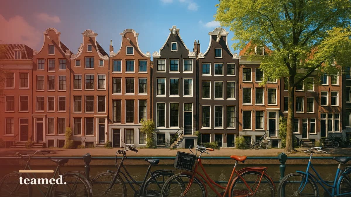 A sunny Amsterdam canal with townhouses and bicycles, evoking Dutch IND sponsorship rules.