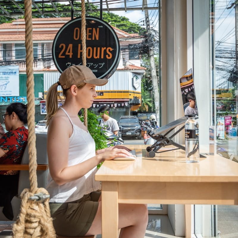 Remote worker with laptop, representing distributed work from South Dakota.