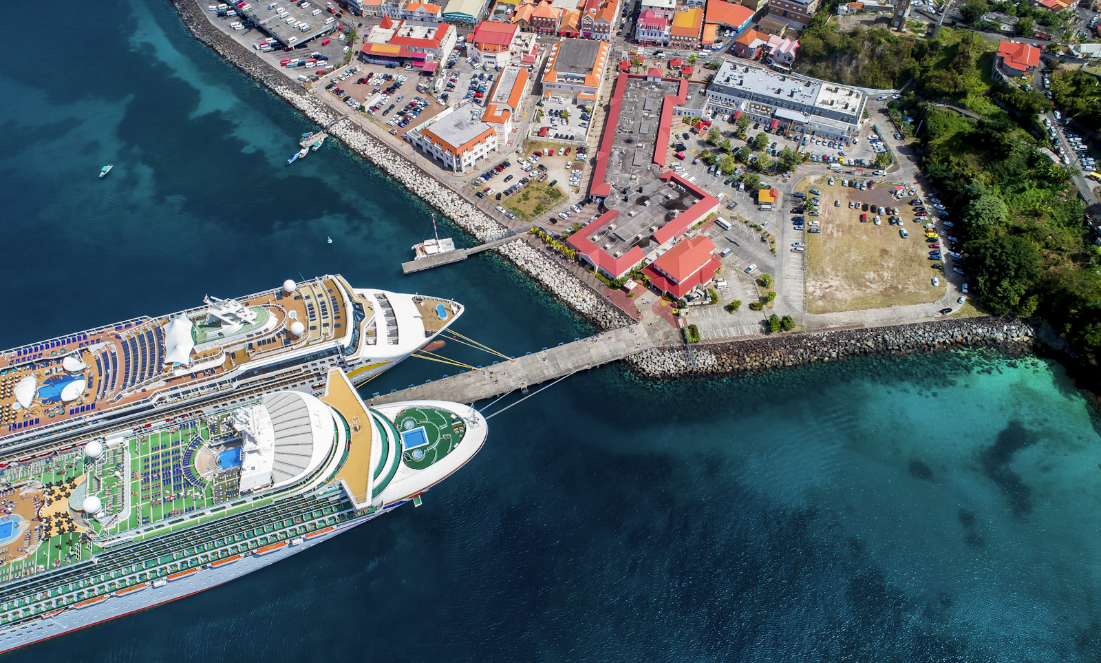 An aerial view of the cruise ship terminal and the red roofs of the waterfront at St. George's, Grenada.