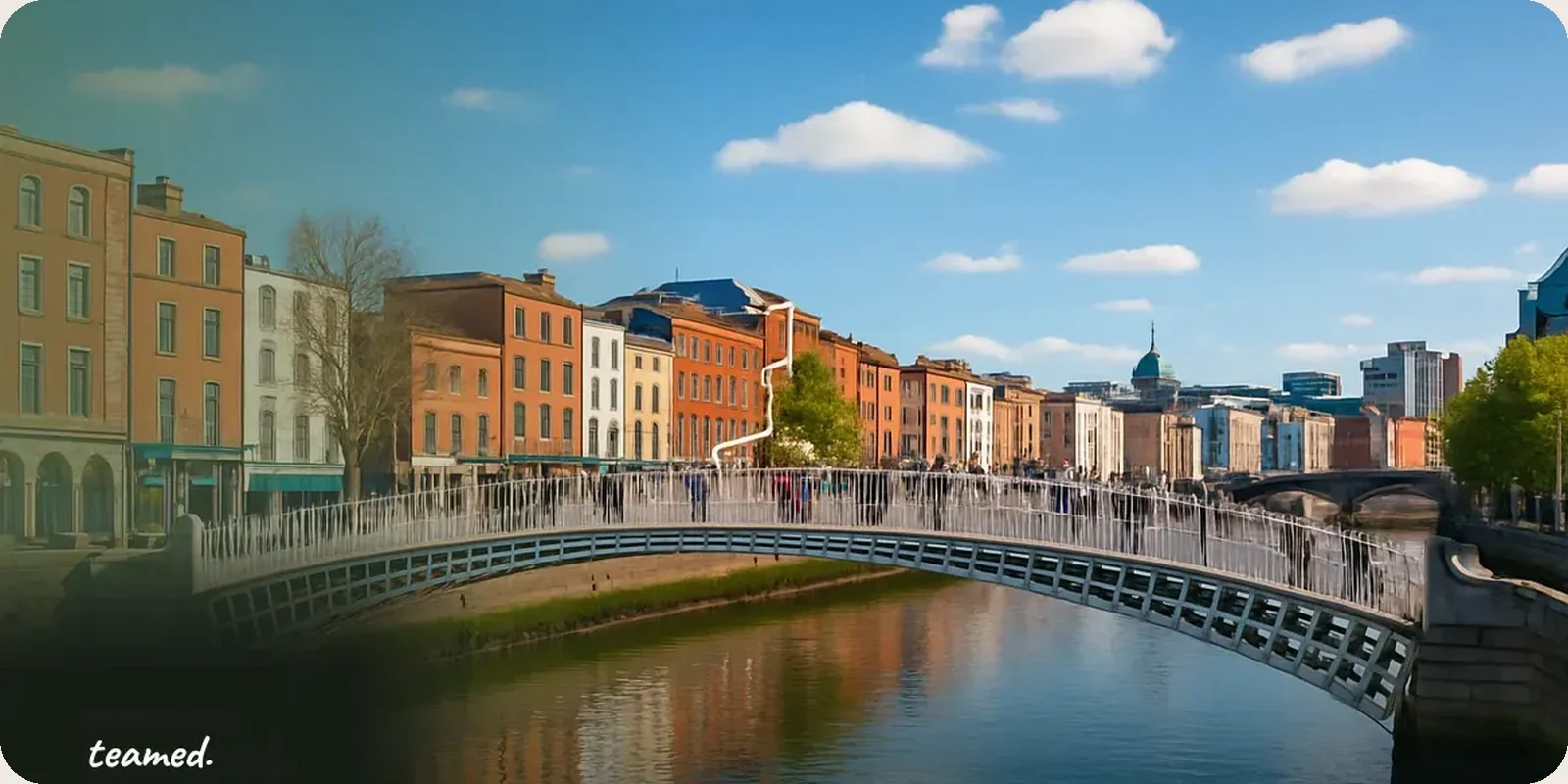 The Ha'penny Bridge over the River Liffey in Dublin with the Georgian quays behind it.