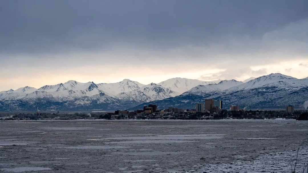 Downtown Anchorage skyline with the Chugach Mountains in the background.