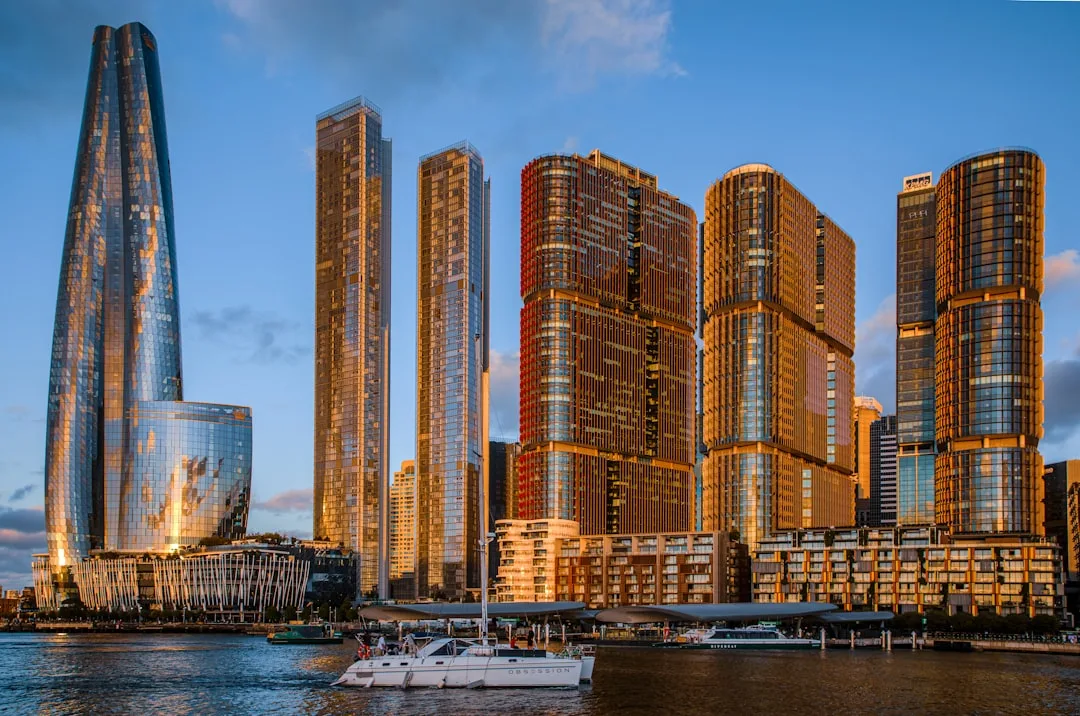 The Sydney Harbour Bridge at sunrise, viewed from the Rocks waterfront.