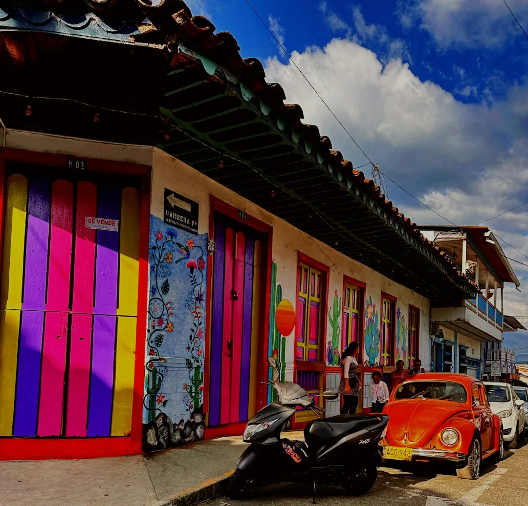 A view across the rooftops of Bogota toward the Andes mountains.