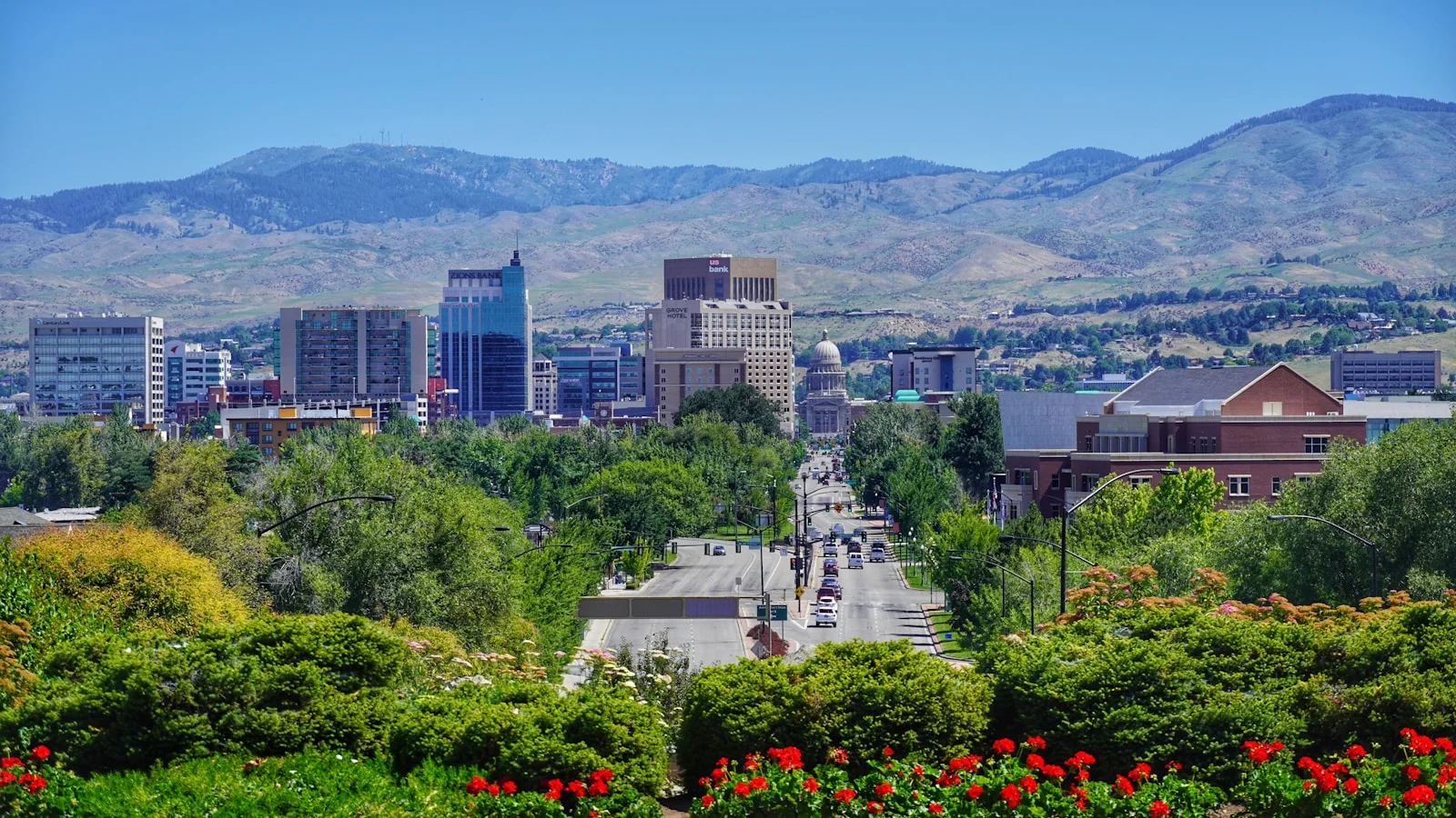 Downtown Boise, Idaho skyline under a clear blue sky during the day.