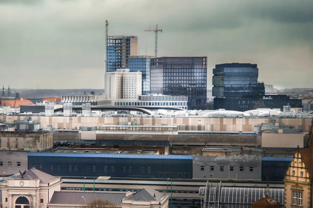 Warsaw city centre skyline with the Palace of Culture visible on a clear day.