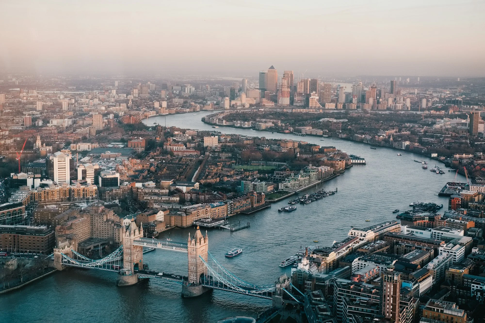 London at dusk with the financial district illuminated.