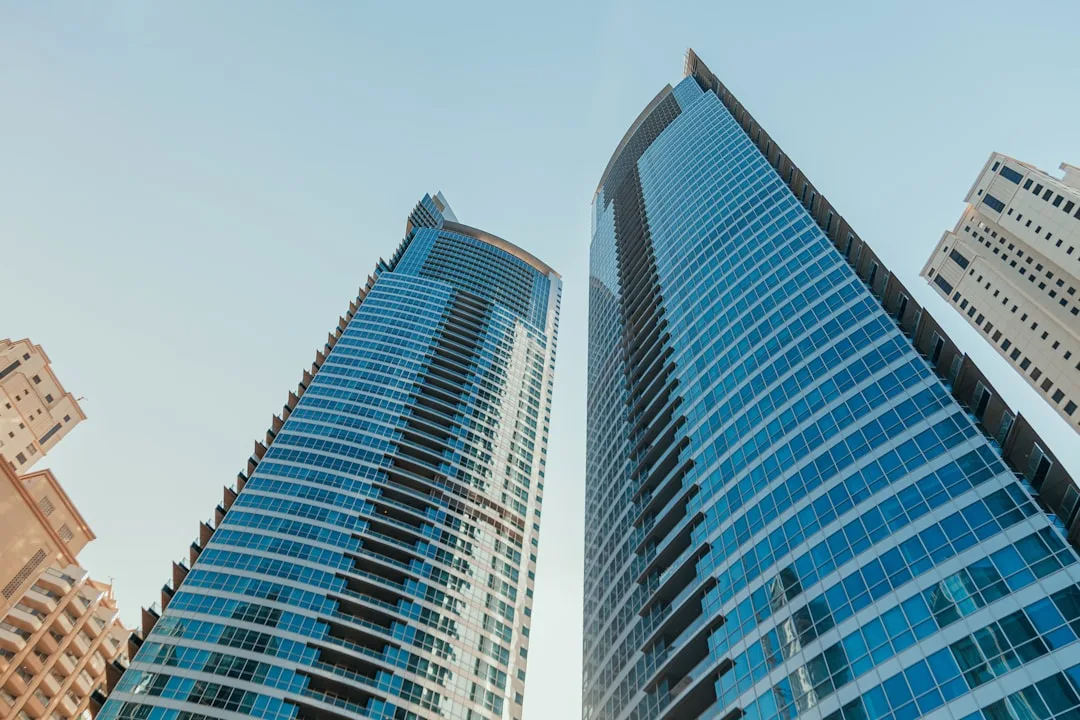 A warm-toned office interior in an Abu Dhabi business district building.