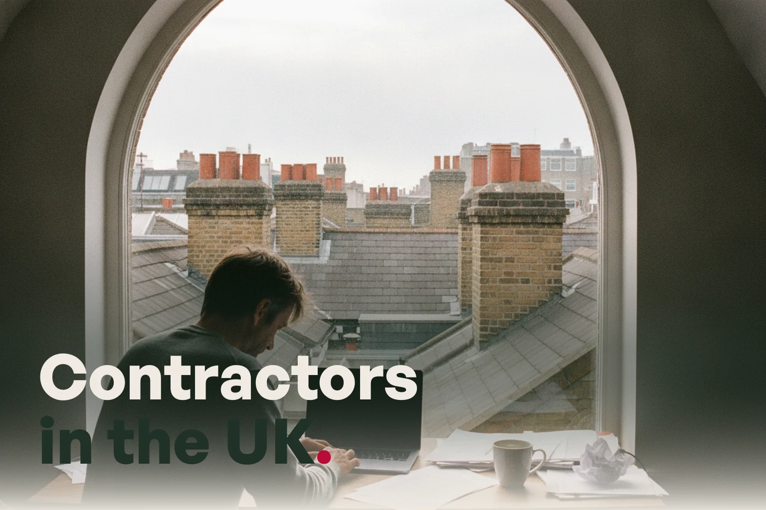 A man working alone at a desk by a window above London rooftops, with the line Contractors in the UK.